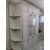 Шкаф в прихожую с зеркальными дверями и угловыми полками